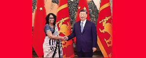 习近平会见斯里兰卡总理阿马拉苏里亚 